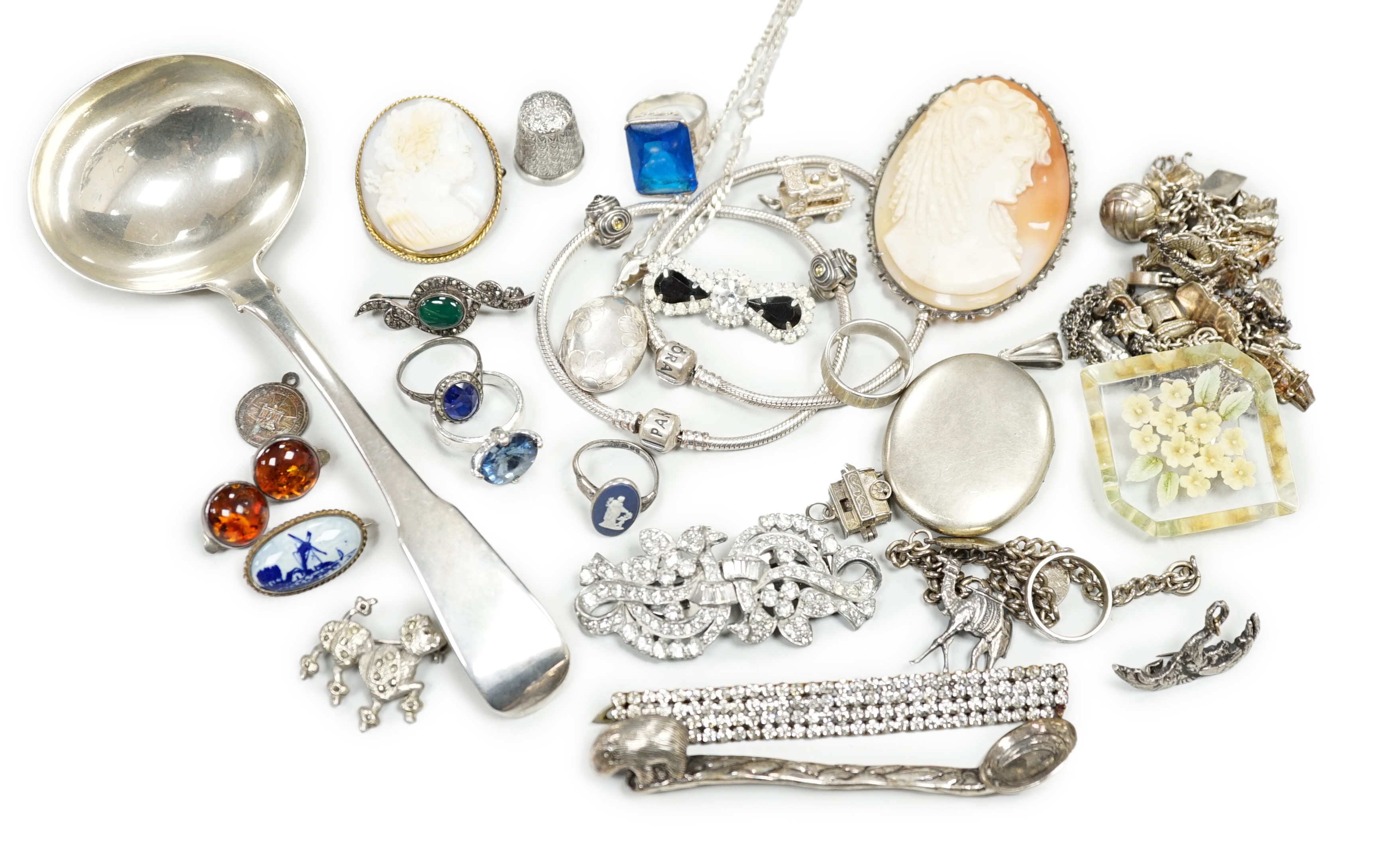 A George III silver sauce ladle, London, 1803 and a quantity of assorted jewellery including two white metal charm bracelets.